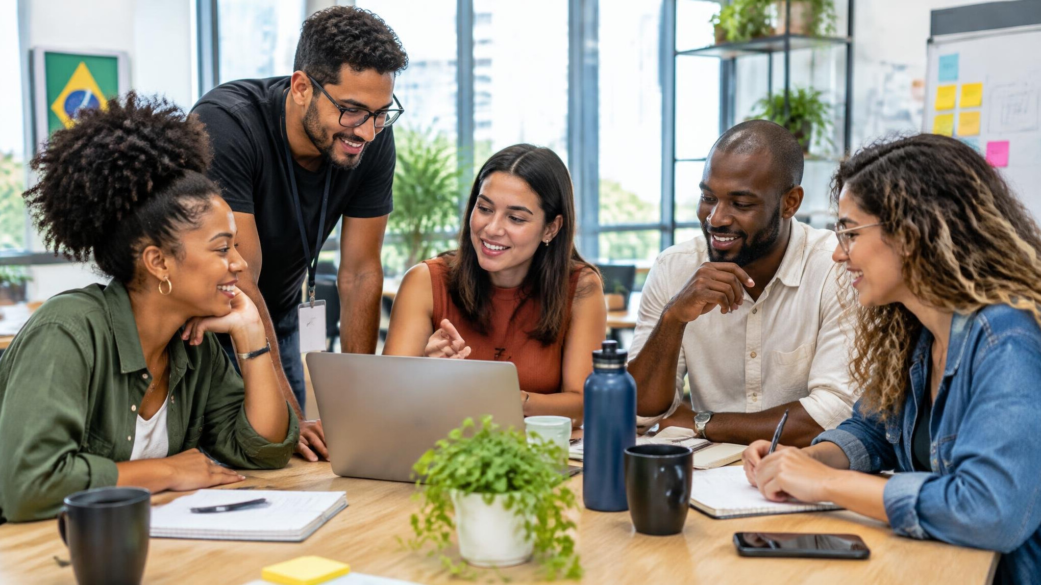 Team collaborating together in a bright office