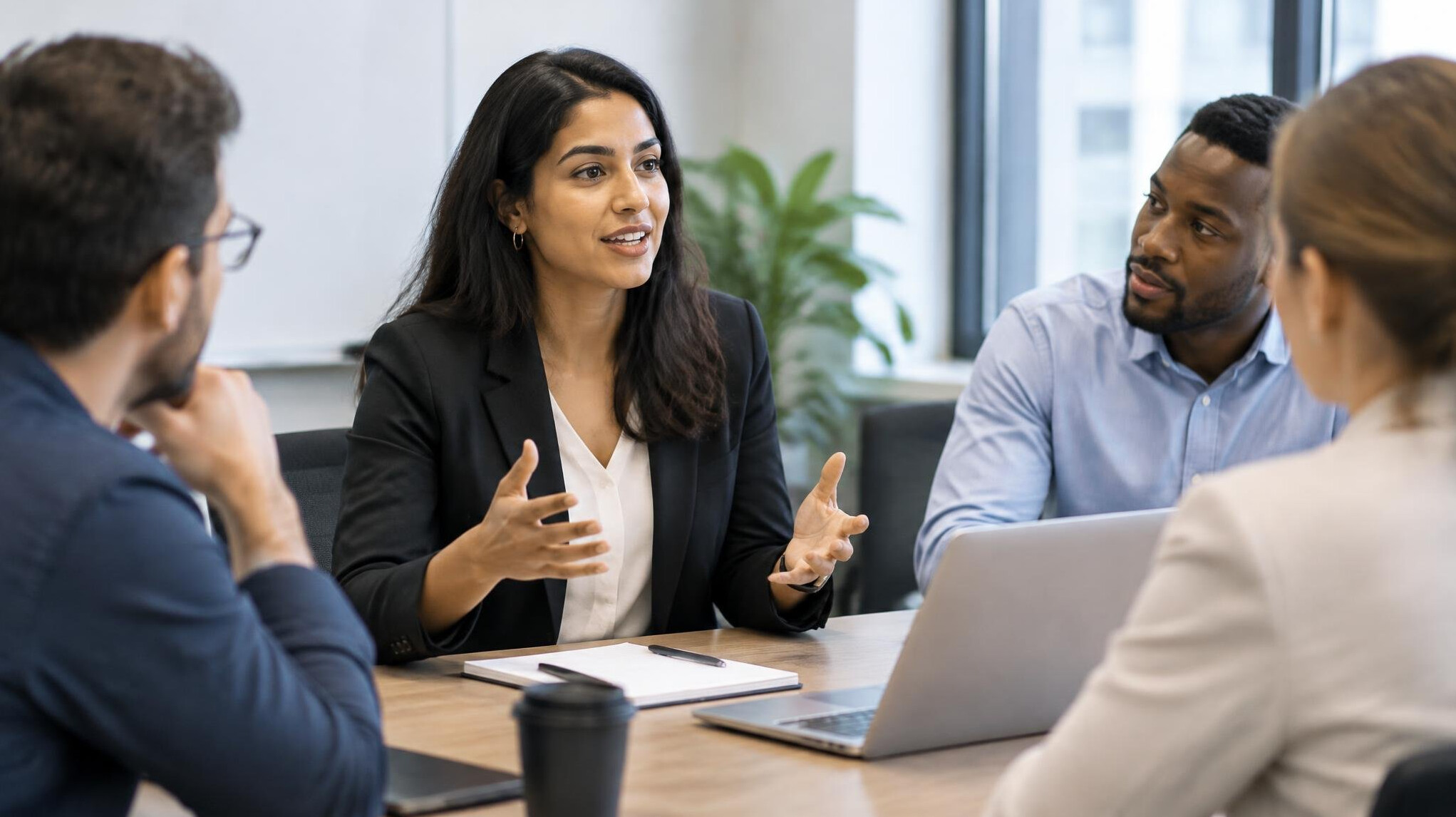 person speaking confidently in meeting